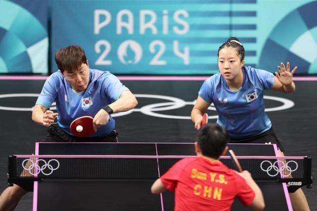 1722302202709099517.jpg 巴黎奥运会丨乒乓球——混双:王楚钦_孙颖莎晋级决赛XxjpseC007442_20240730_MVPFN0A001.jpg